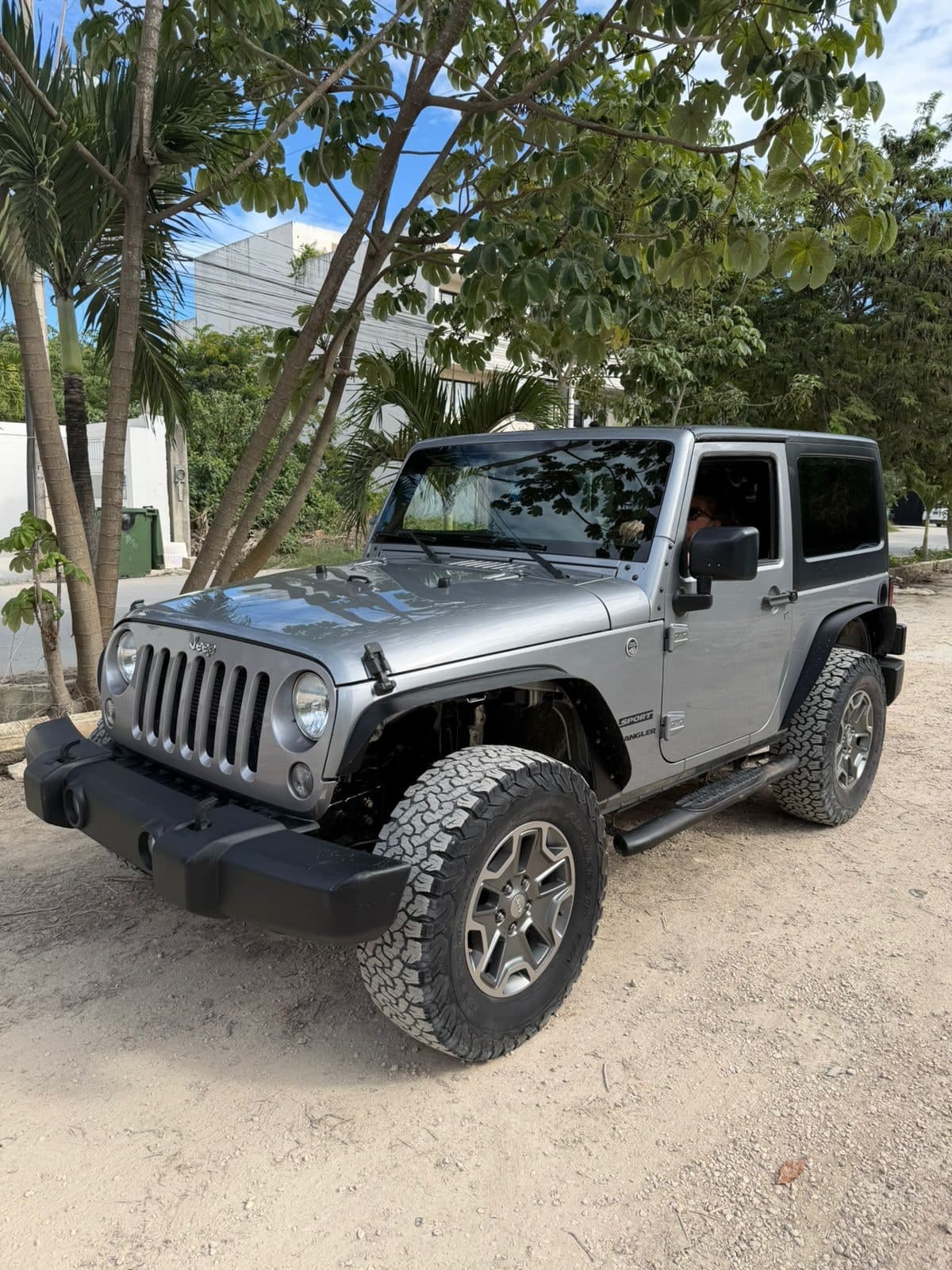 Grey Jeep Wrangler 2-door available to rent in Tulum